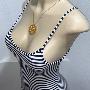 Tory Burch gold necklace with a huge yellow leather Monogramed logo medallion